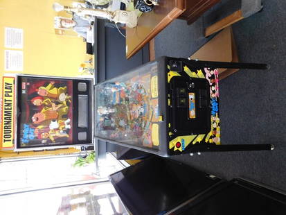 Family Guy Pinball Machine: Family Guy pinball machine. Measures 52 in. long, 80 in. tall and 27 1/2 in. wide. By Stern Pinball.