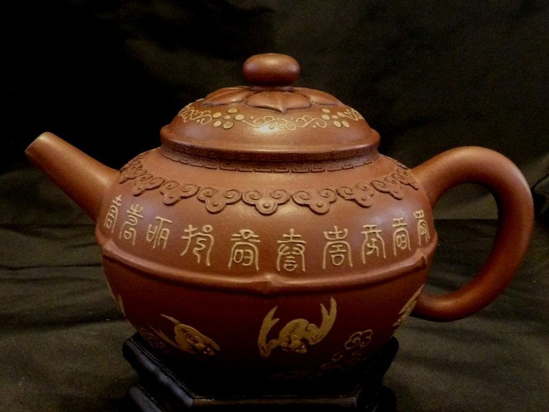 Chinese Yixing Zisha Teapot with Mark: Chinese Yixing Zisha Teapot with Mark. Measures 6 1/2 in. long and 3 1/2 in. tall.