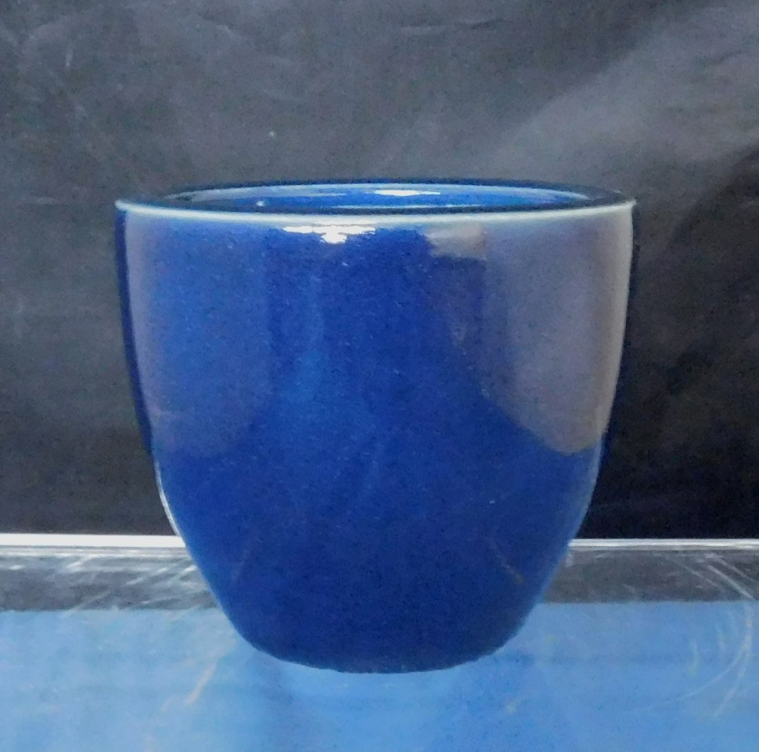 Glazed Chinese Porcelain Cup: Glazed Chinese Porcelain Cup. Measures 2 1/2 inches tall and 3 inches diameter.
