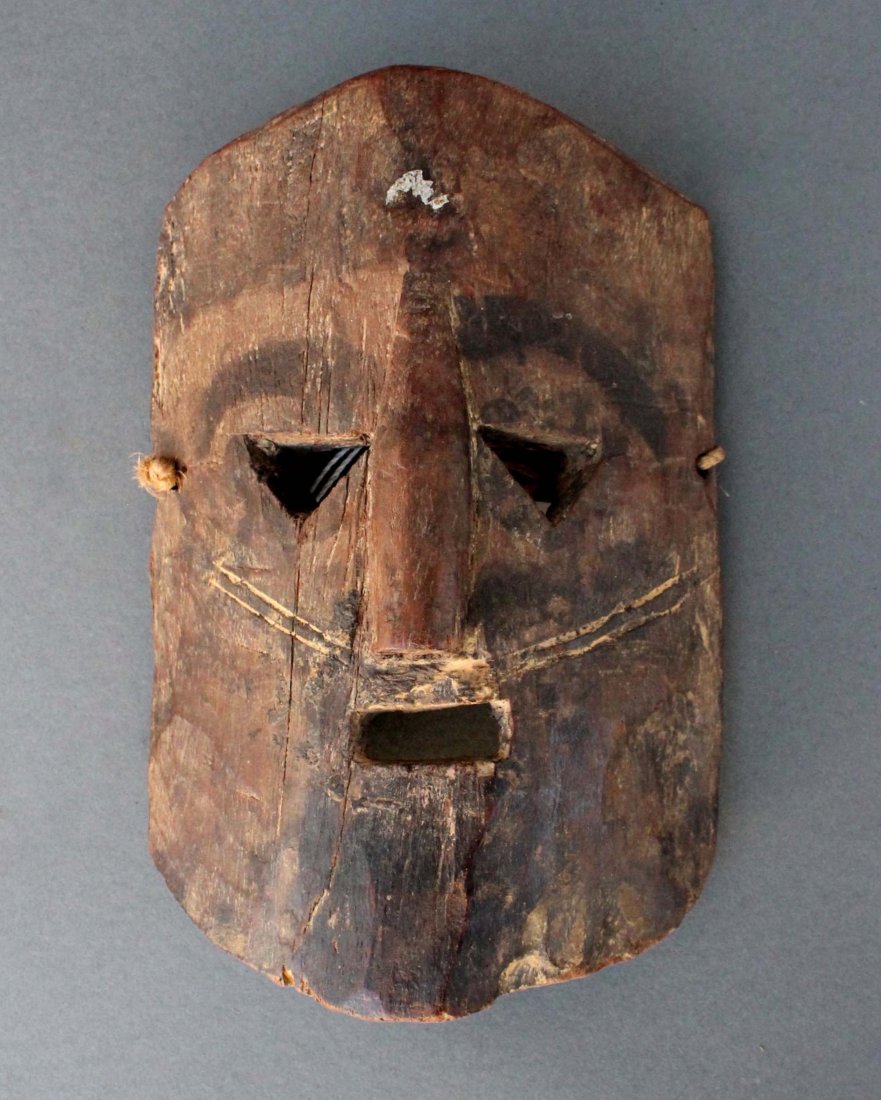 Mask: Mask. Wood, paint. Nepal. H: 7". W: 5.5" Shipping costs noted below are estimates for USA locations via FEDEX ground. Actual costs may vary.