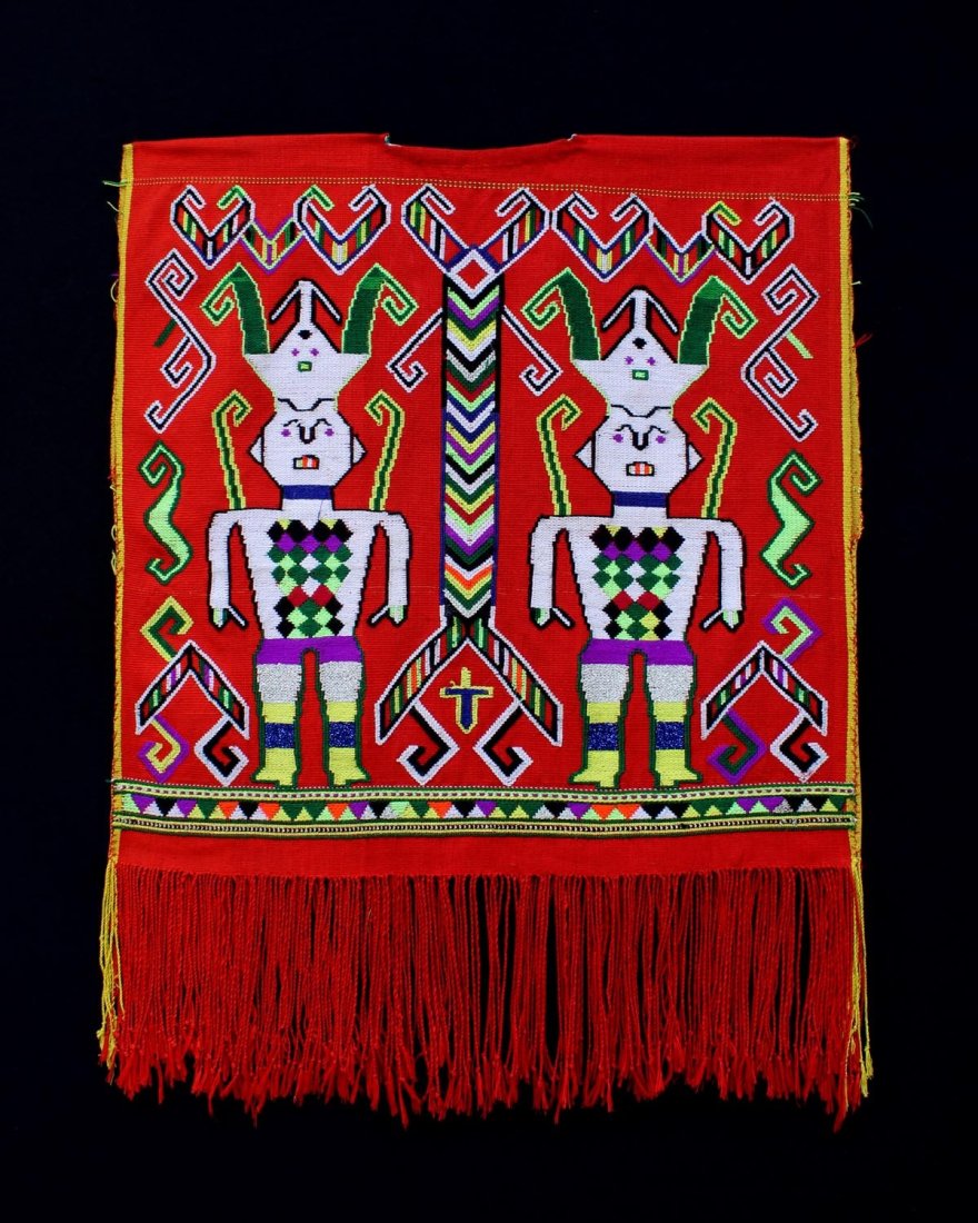Man's Hunting Jacket: Ibanic Dayak. Sarawak State or West Kalimantan, Borneo Island, Malaysia or Indonesia. Cotton, dyes. Sungkit motifs. Not including fringe, H: 20" (50.8 cm), W: 20" (50.8 cm). With images of two large p