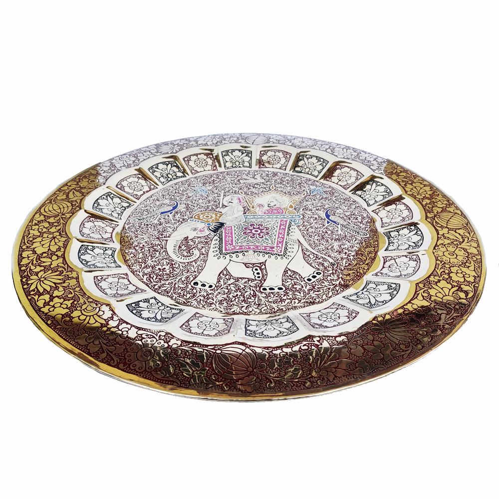 Brass Handcrafted Wall Hanging Plate 24": Product Description : Item : Brass Metal Hand Meenakari Work Ancient King on the elephant Wall Hanging Plate for Home Decor Metal : Brass Package Includes : 1 Brass Plate Plate Size : 24 Inches Plate