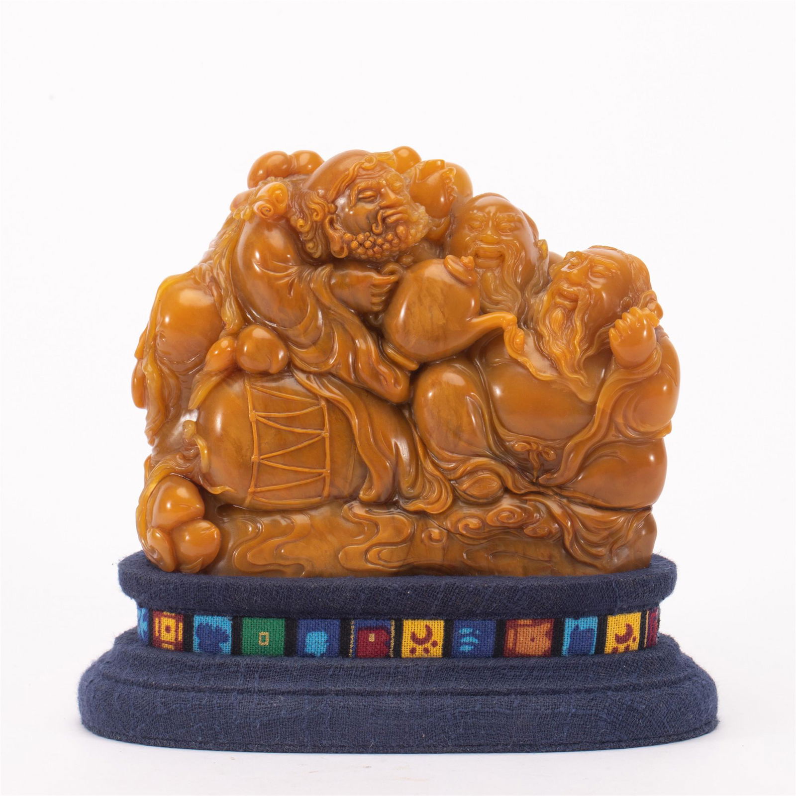 A CARVED SOAPSTONE BOULDER (1 of 8)