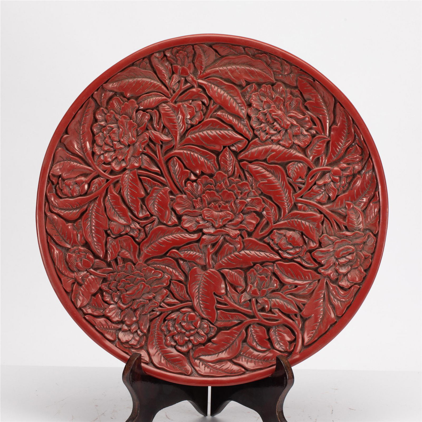 A CARVED CINNABAR LACQUER FLOWERS PLATE (1 of 6)