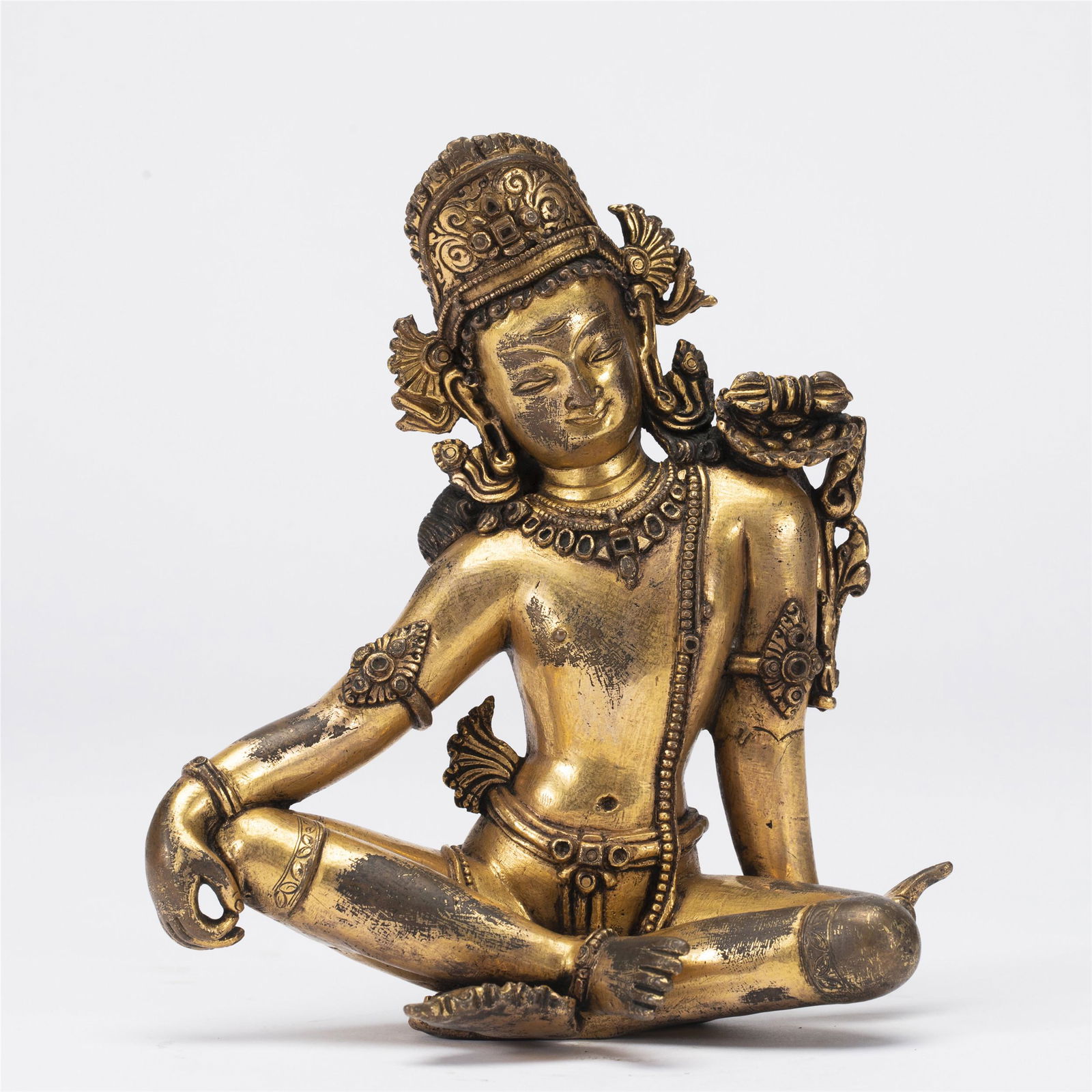 A NEPALESE BRONZE-GILT FIGURE OF PADMAPANI (1 of 8)