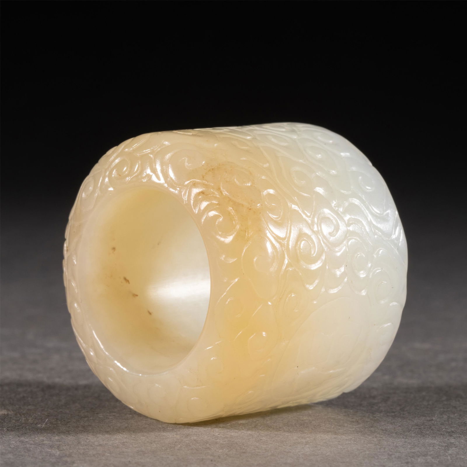 A CARVED JADE ARCHER RING (1 of 7)