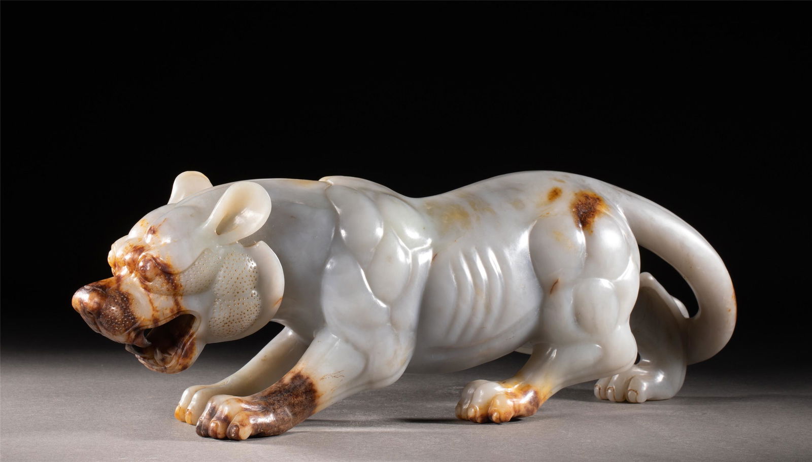 A CHINESE CARVED JADE BEAST (1 of 10)
