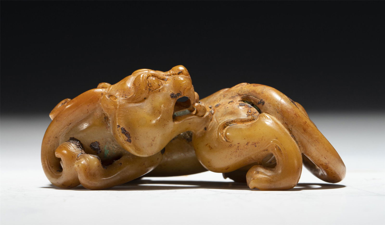 A CHINESE CARVED YELLOW JADE MYTHICAL BEAST (1 of 9)