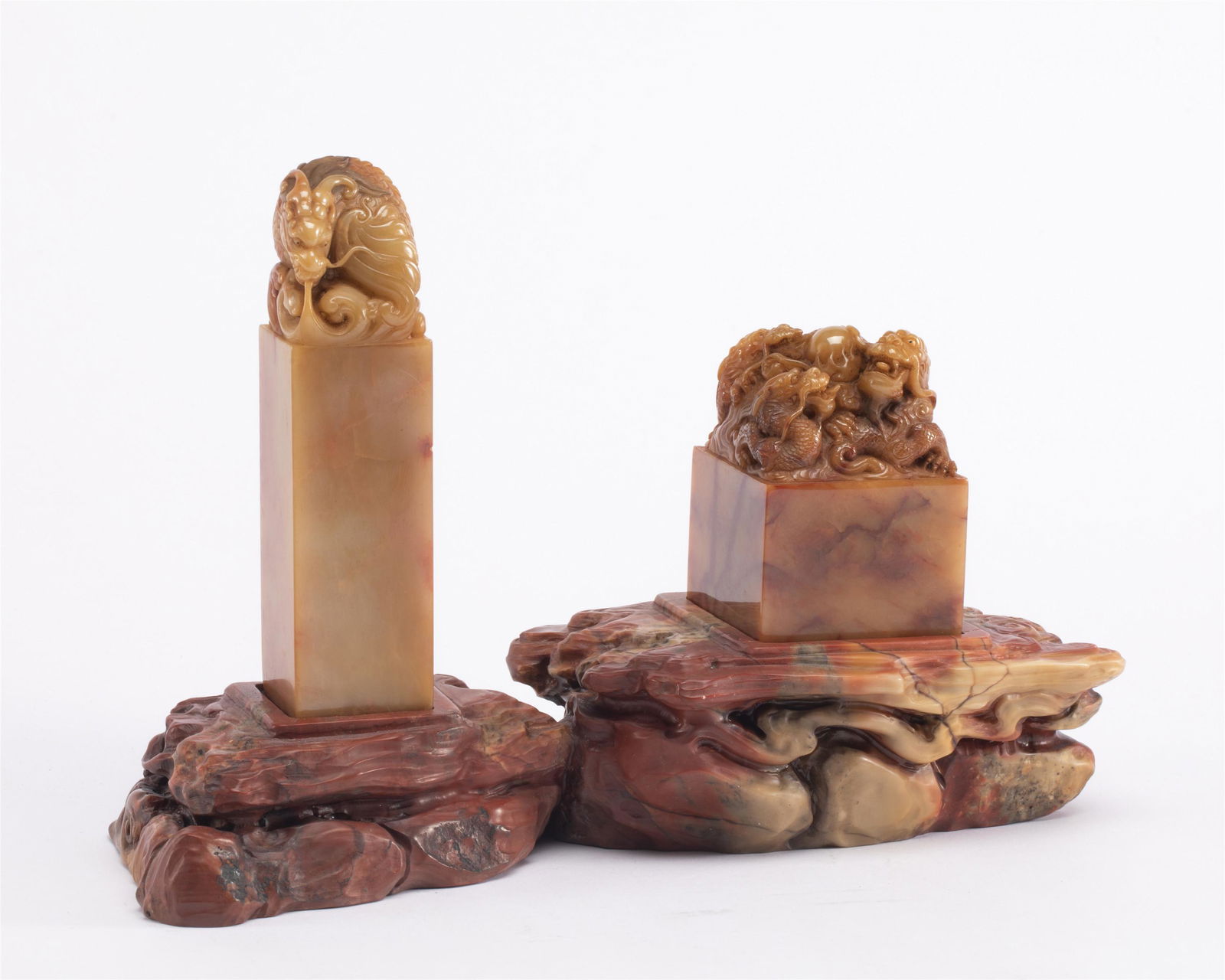 TWO CARVED SOAPSTONE BEAST SEALS (1 of 9)