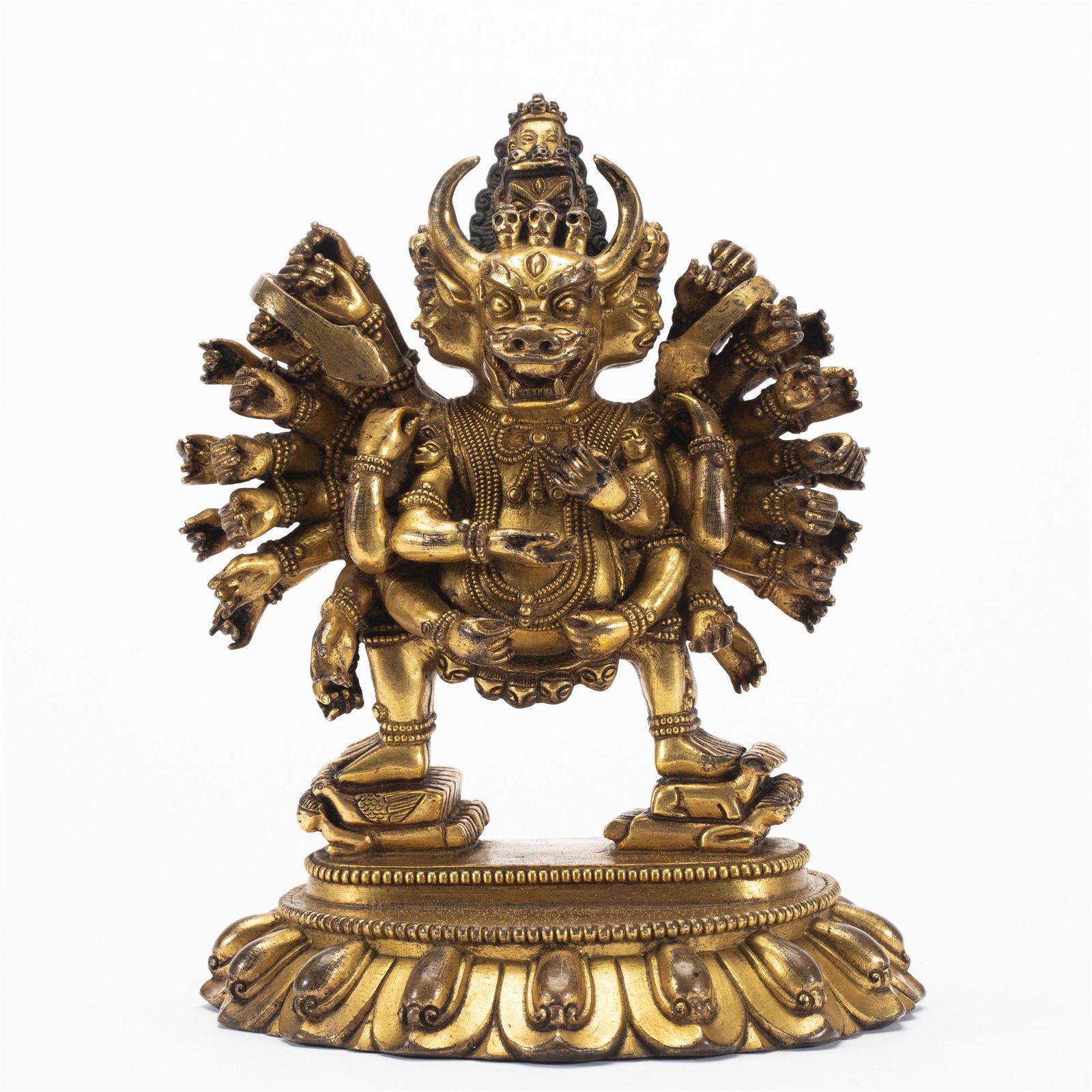 A TIBETAN BRONZE-GILT FIGURE OF YAMANTAKA (1 of 9)