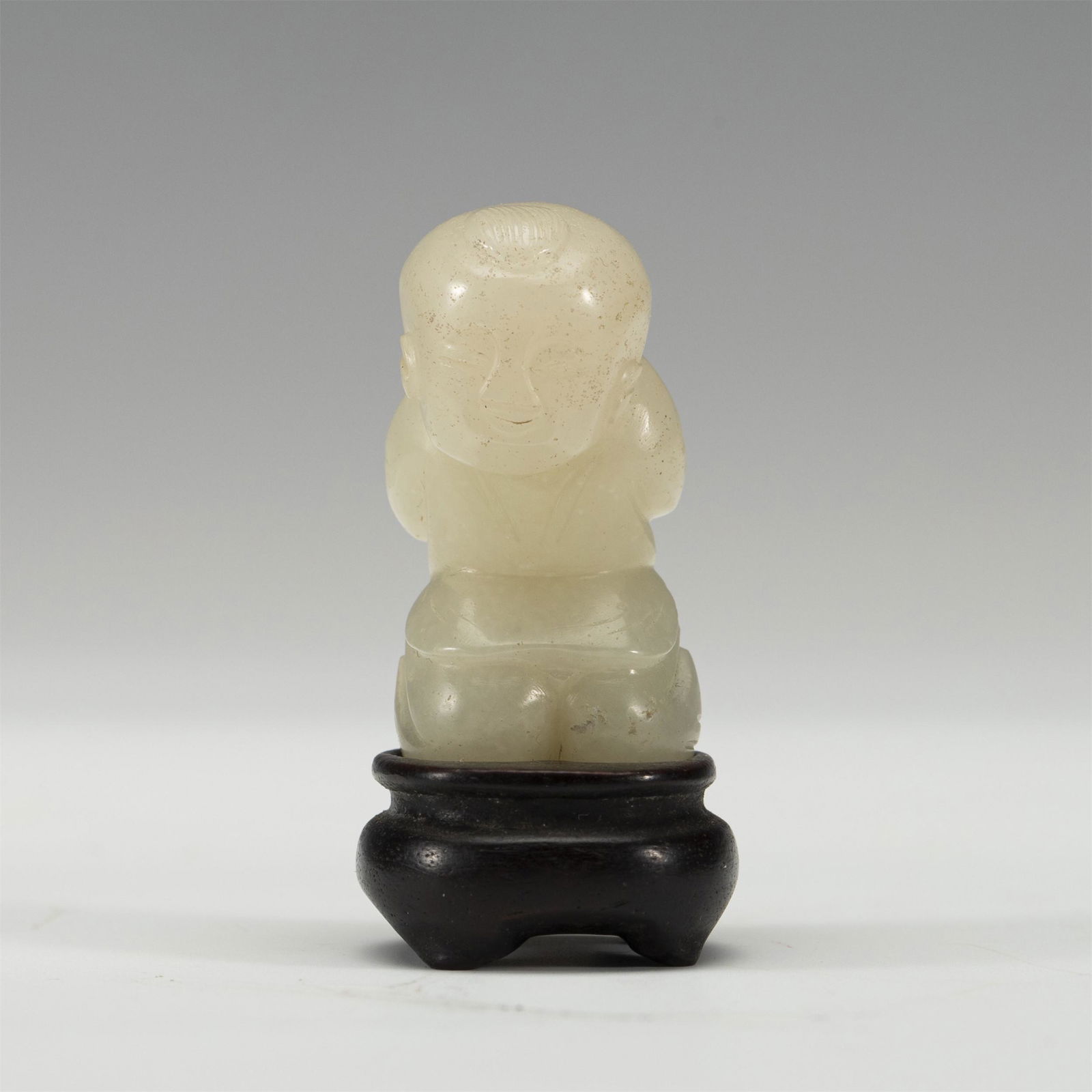 A CHINESE CARVED JADE FIGURE (1 of 9)