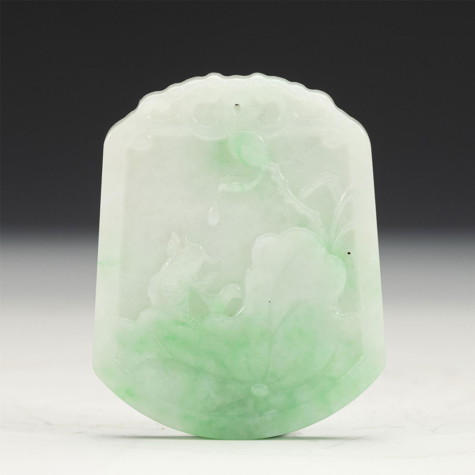 A CHINESE CARVED JADEITE PLAQUE (1 of 9)