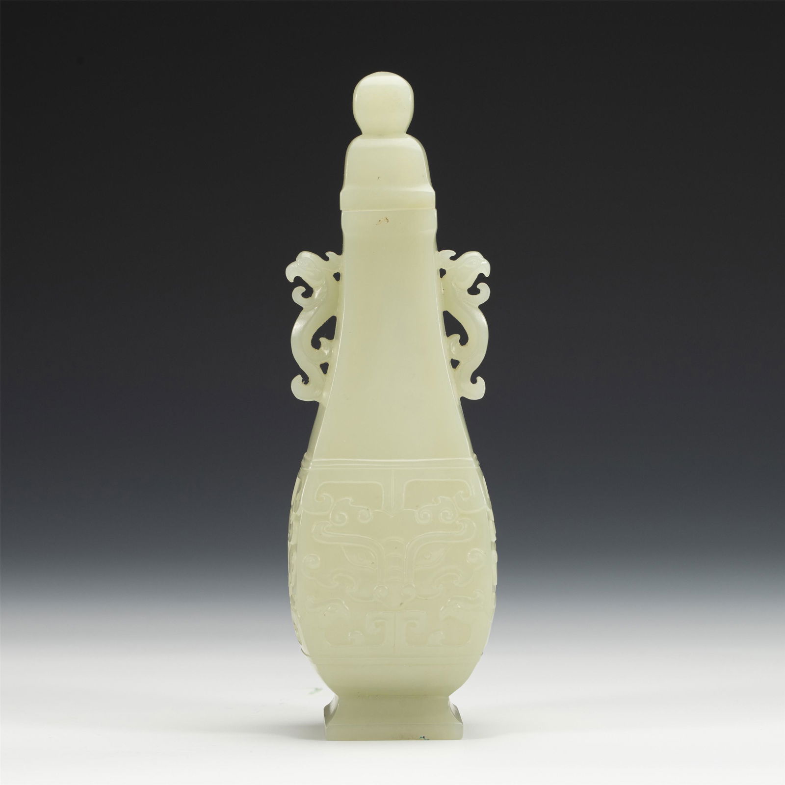 A CHINESE CARVED JADE VASE WITH COVER (1 of 9)