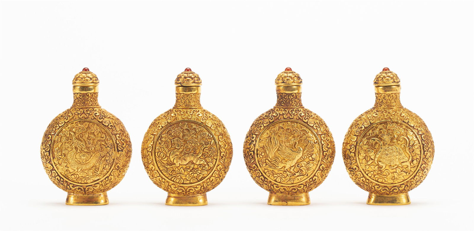 GROUP OF FOUR BRONZE-GILT MYTHICAL BEASTS SNUFF BOTTLES (1 of 20)