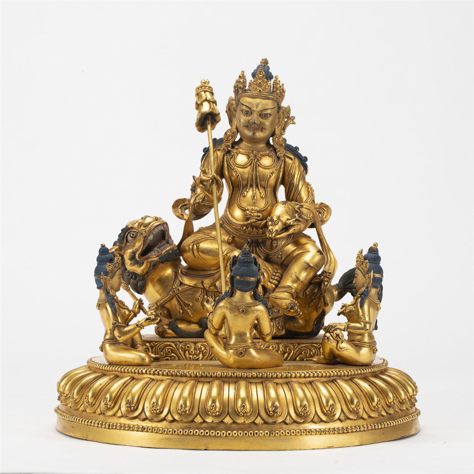 A TIBETAN BRONZE-GILT FIGURE OF JAMBHALA (1 of 10)