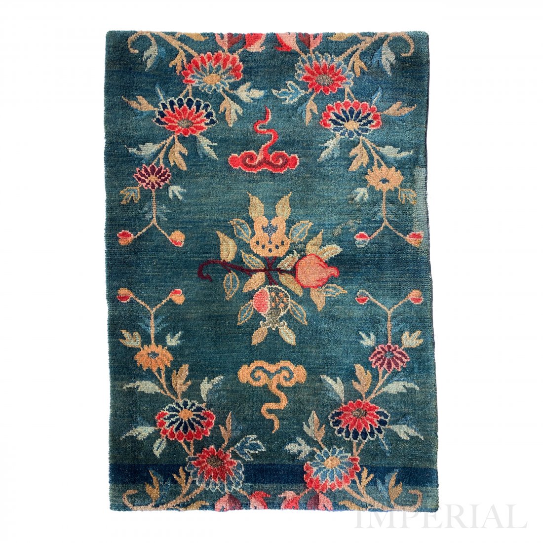 A RARE TIBETAN RUG, 1920s.: A very fine decorative rug, Tibet, Early 20th Century. The artwork on the rug is very skillfully done, most probably by a master weaver. At a glance the artwork looks almost like they were drawn with 