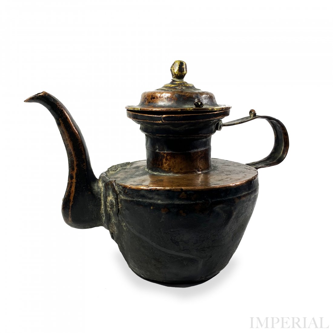 A COPPER KETTLE, TIBET, 19th CENTURY: A COPPER KETTLE, Tibet, 19th Century. Made in the traditional Tibetan style, this kettle would be used in everyday life in every household and monasteries for serving tea. The lower half of the kettle