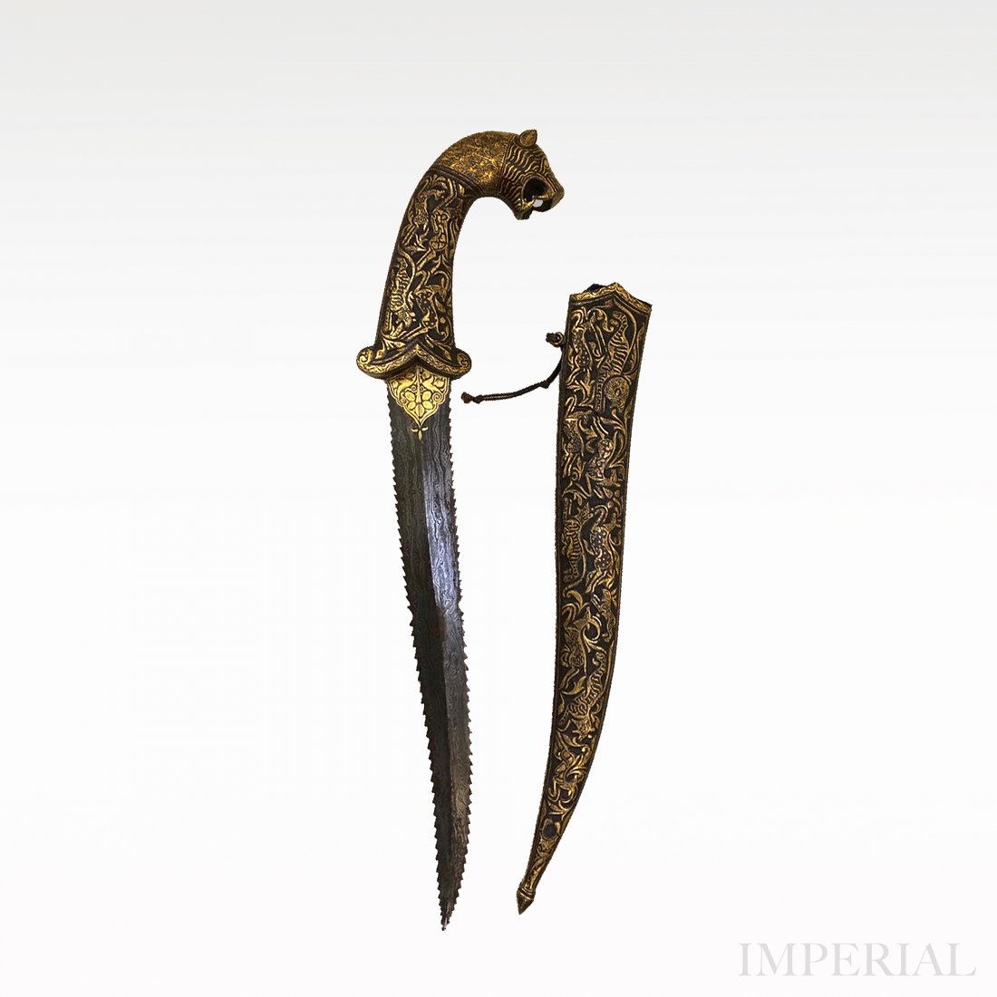 A MUGHAL DAGGER, INDIA: A Magnificent Mughal dagger with gold plated body and Damascus Steel blade. The works on the body reflects the most exceptionally skilled artisans of the time. The scabbard is richly decorated with im