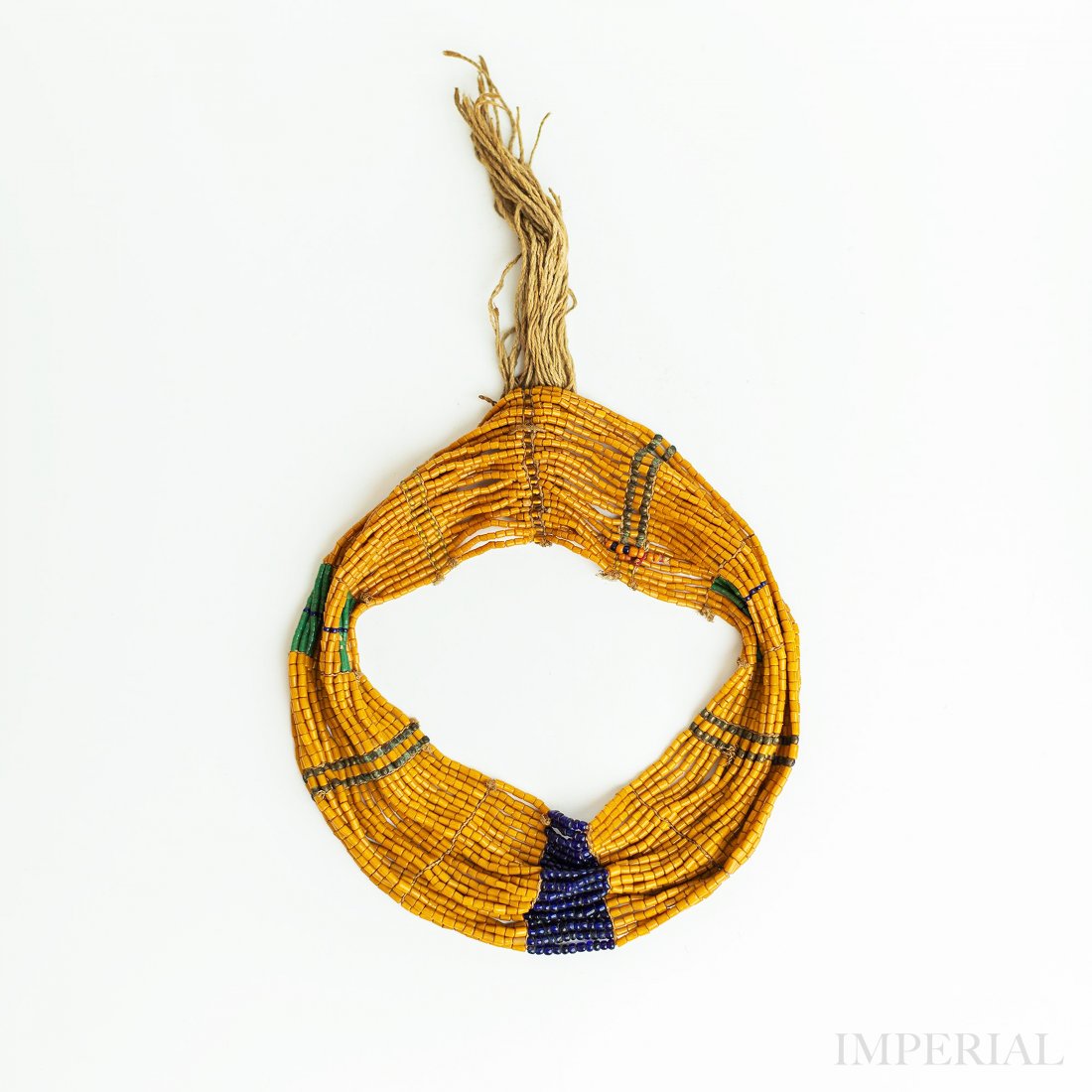 A KONYAK TRIBE HEAD ORNAMENT, NAGALAND, 19th CENTURY (1 of 2)