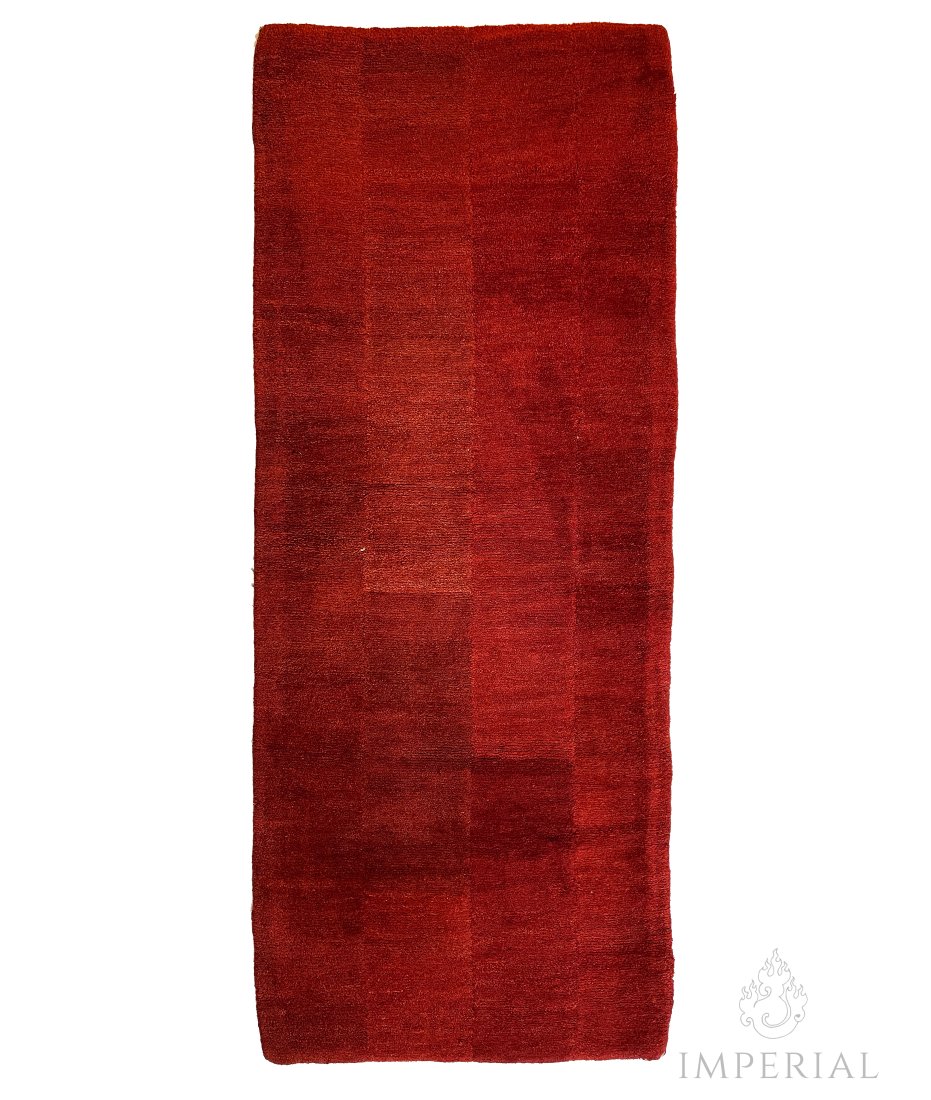 A MAROON LAMA'S "TSUDRUK" RUG, TIBET, 1900s (1 of 3)