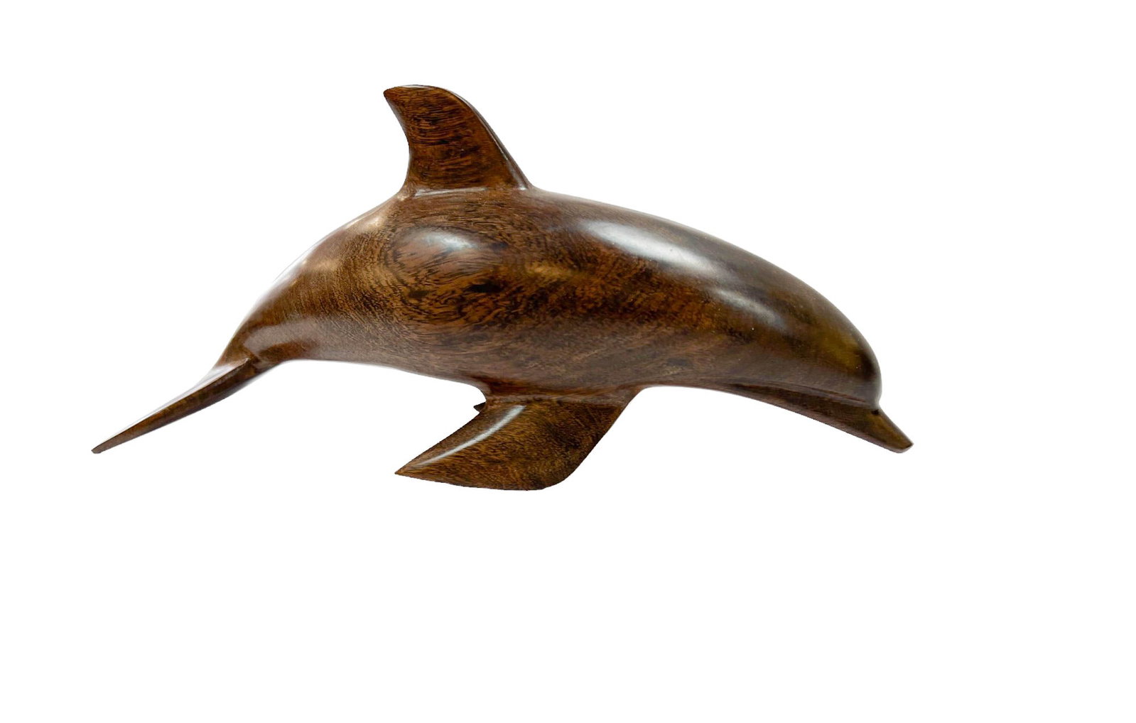 Desert Ironwood Dolphin Figurine: Desert Ironwood dolphin figurine. Ironwood is native to the Sonoran Desert in the southwestern United States and northwestern Mexico. Dimensions: 6.25" H x 13.5"long x 2.75" D.