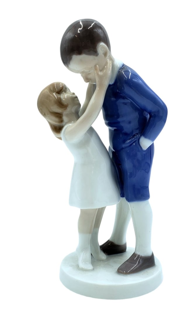 Bing & Grondahl Figurine, "Beloved Big Brother": Bing & Grondahl by Royal Copenhagen figurine titled "Beloved Big Brother," #1781. DIMENSIONS: 8.5"high, 3" wide, 3" deep. ORIGIN: Denmark CIRCA: pre-1984