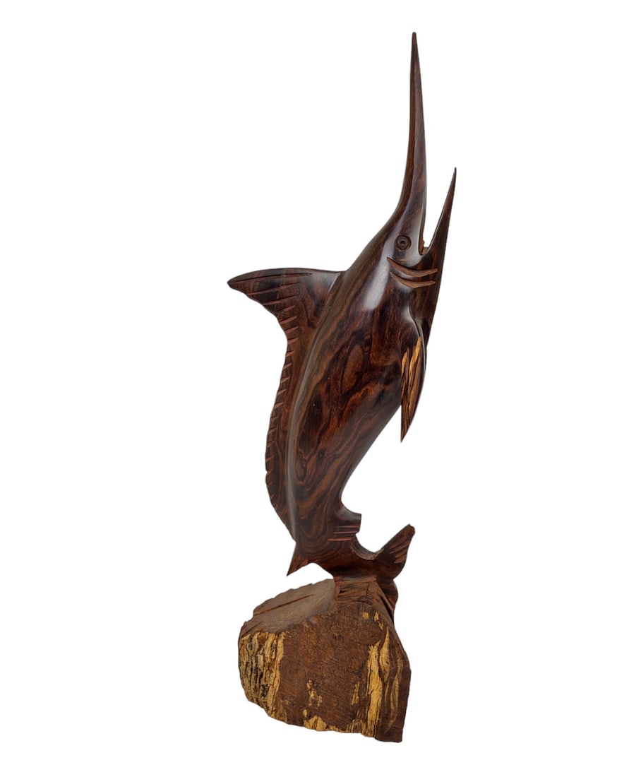 Desert Ironwood Swordfish Figurine: Desert Ironwood swordfish figurine. Ironwood is native to the Sonoran Desert in the southwestern United States and northwestern Mexico. DIMENSIONS: 18.5" H x 6" W x 2.5" D