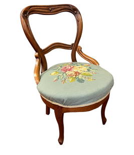 PETITE NEEDLEPOINT UPHOLSTERED CHAIR: Small-scale dressing table or desk chair with a carved open back and needlepoint upholstered seat. The seat is eight-way hand-tied. Dimensions: Width: 19.5 inches (49.53 cm) Depth: 19 inches (48.26 cm