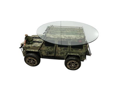 Pop Art Mercedes G-Wagon Glass Top Coffee Table - Limited Edition: This camo patterned pop art Mercedes G. Wagon glass top coffee table, pays homage to the iconic brand, reimagining automotive luxury as functional art. The piece offers interior storage, perfect for s