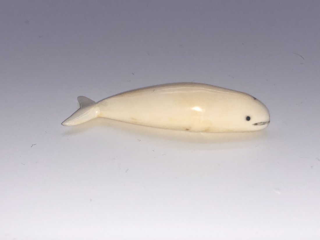 Late 19th Century Native Inuit Carved Whale Fetish Effigy: Late 19th Century Native Inuit Carved Whale Fetish Effigy. Excellent antique condition. See pictures for details as part of description. Approximate Measures: 1.84” long; 0.43” high; and 0