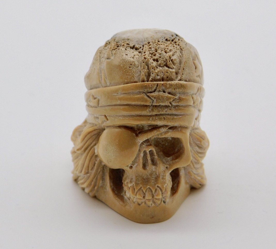 Zuni Carved Mastadon Ivory Pirate Biker Skull Fetish Effigy: Excellent condition. See pictures for details as part of description. Measures approximately 1.5” high x 1.4” deep x 1.3” wide.