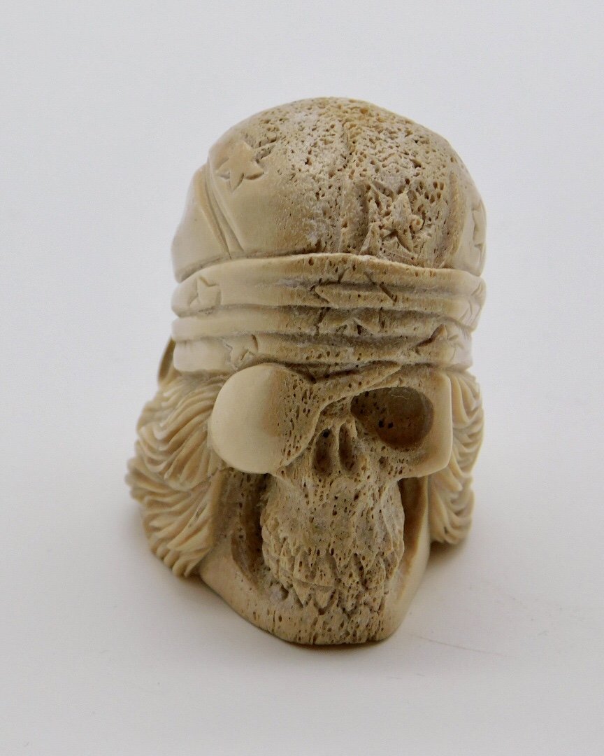 Zuni Carved Mastadon Ivory Pirate Biker Skull Fetish Effigy: Excellent condition. See pictures for details as part of description. Measures approximately 1.7” high x 1.6” deep x 1.3” wide.