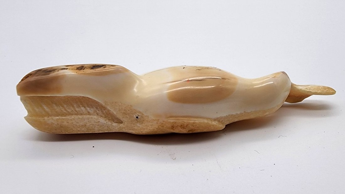 Native Inuit Carved Fossil Walrus Tusk Whale Fetish Signed By Eric Baker 1991: Native Inuit Carved Fossilized Walrus Tusk Whale Fetish Signed By Eric Baker 1991. See photos for details as part of description. Excellent vintage condition. Measures approximately: 3.83 inches long