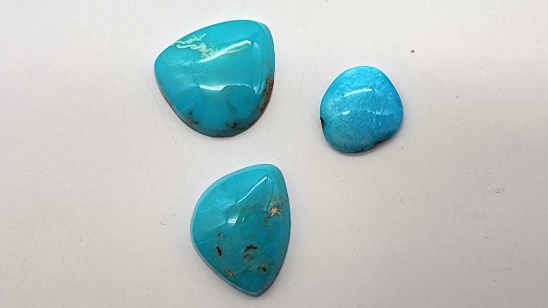 Lot of 3 Sleeping Beauty Turquoise Cabochons 43.35 Carats: Lot of 3 Sleeping Beauty Turquoise Cabochons 43.35 Carats. See photos for details as part of description. Excellent condition. Retails for 3 USD per carat. Total retail value is 130.05 USD.