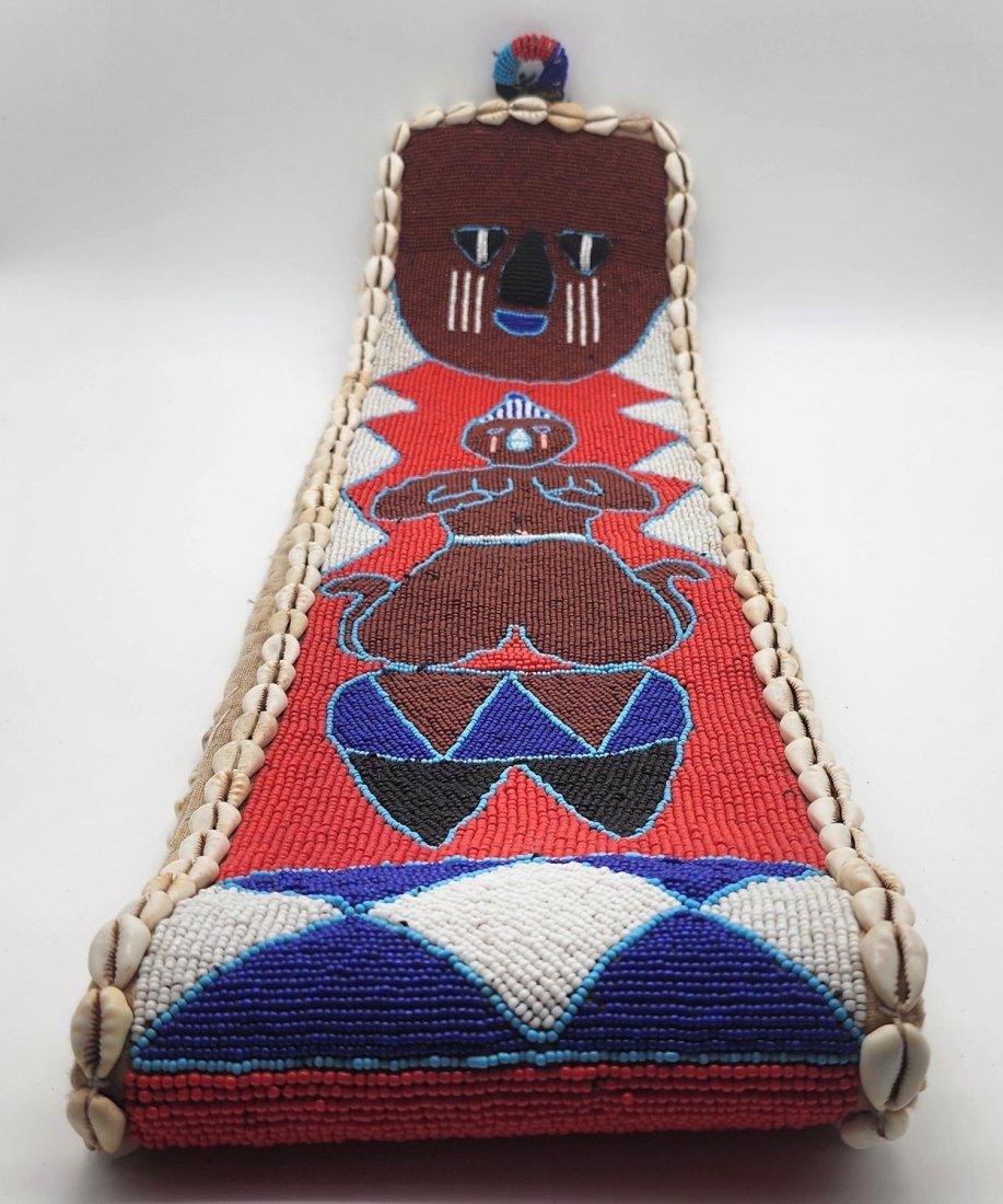 African Yoruba Beaded Medicine Man Belt: African Yoruba Beaded Medicine Man Belt. See photos for details as part of description. Excellent condition. Measures approximately: 51 inches long x 6.5 inches wide.