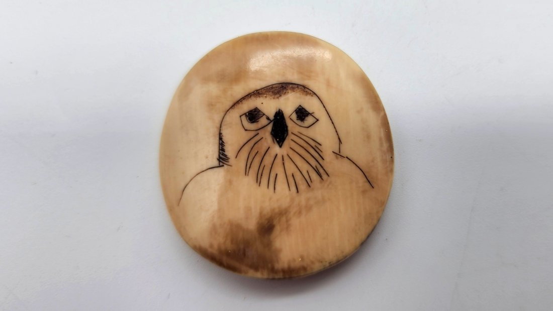 Inuit Fossilized Mammoth Ivory Scrimshaw Pendant of Owl: Inuit Fossilized Mammoth Ivory Scrimshaw Pendant of Owl. See photos for details as part of description. Excellent condition. Measures approximately 1.30 inches long x 1.30 inches wide x 0.14 inches hi