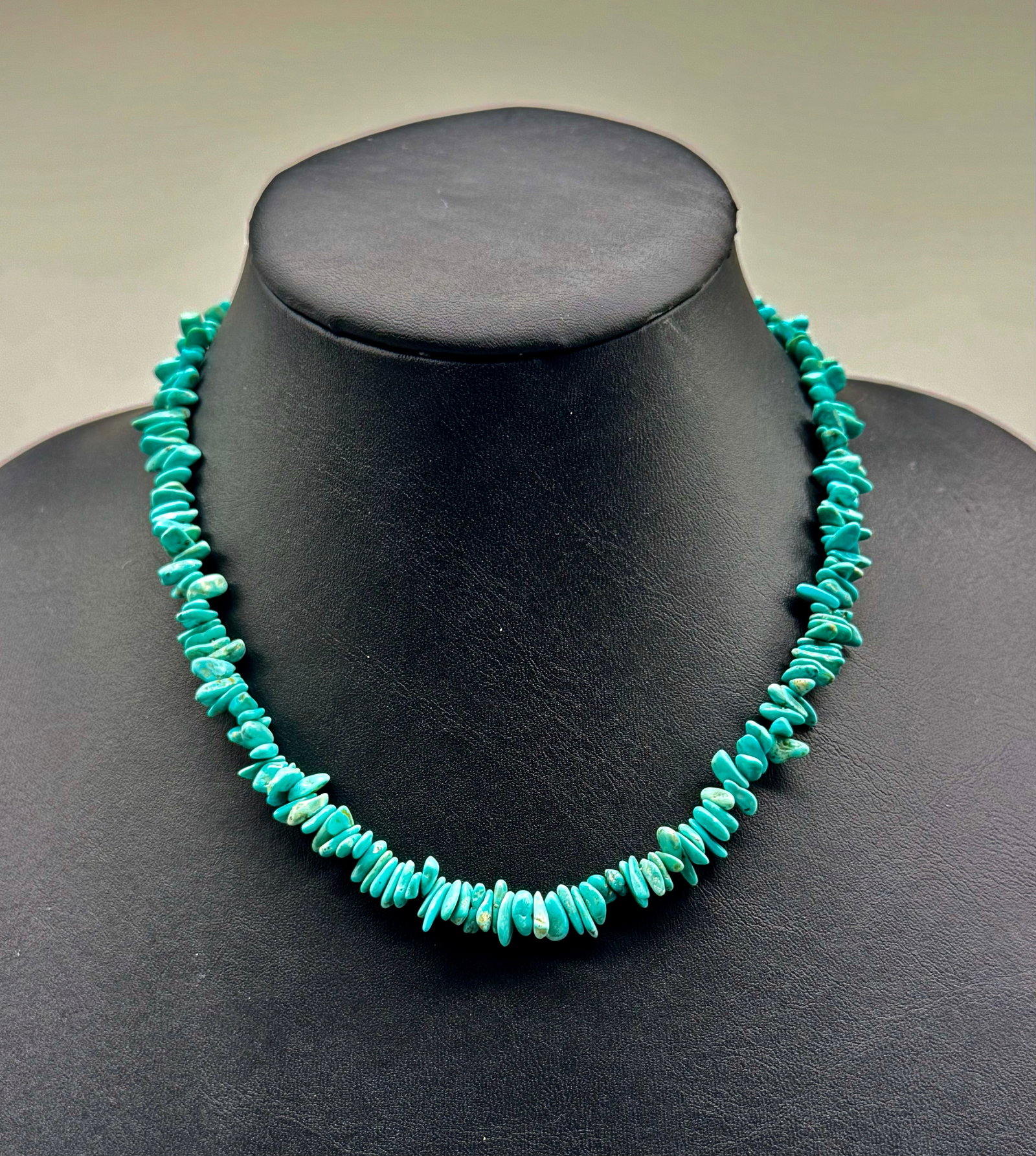 Native Navajo Turquoise Sterling Bead Necklace: 1990's Native Navajo Kingman Turquoise nugget necklace with sterling silver bench beadswith traditional hook and loop closure.Weighs 17 grams with a total length of 17.5 inches. Excellent vintage cond