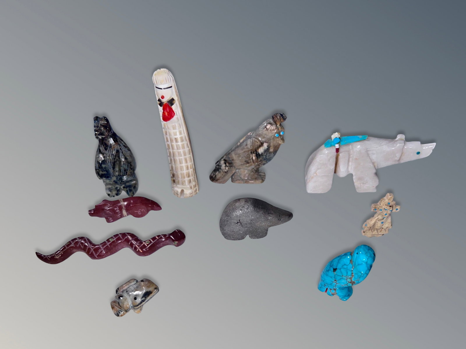Ten Native American Zuni Fetishes: Ten Native American Zuni fetishes. Largest measures approximately 3 inches long.