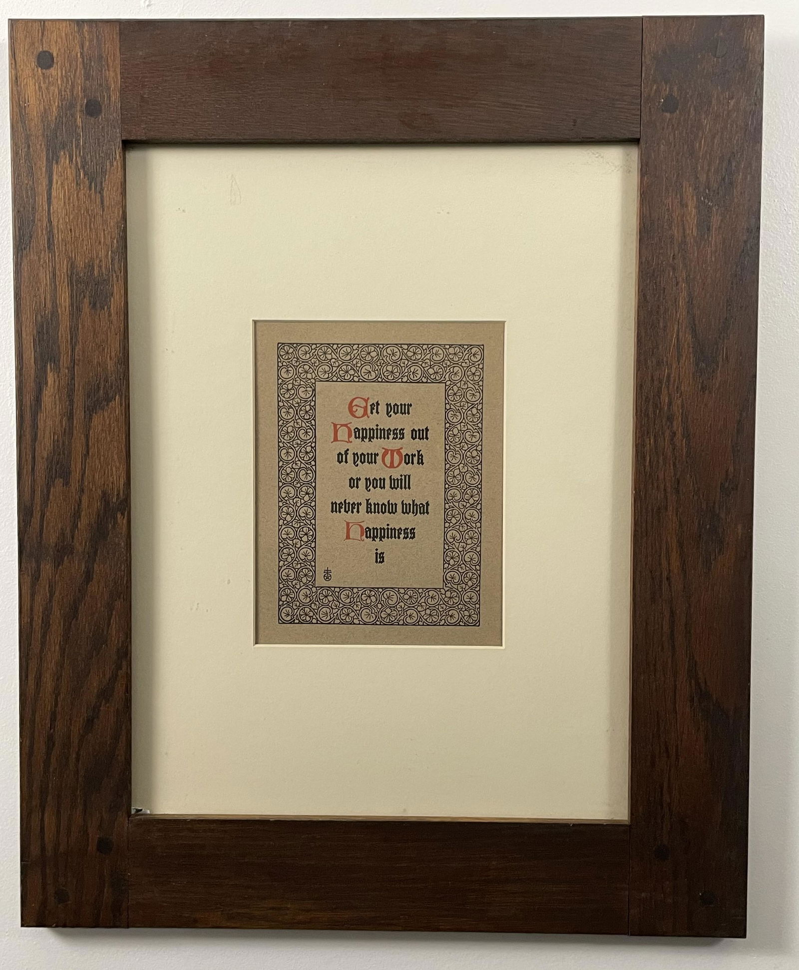 Framed Antique Proverb by Elburt Hubbard for Roycroft: "Get Your Happiness Out of Your Work or You will Never Know what Happiness is"; aphorism by Elbert Hubbard for Roycroft, NY, likely prior to 1910. Original print on brown butcher's paper, text in Goth