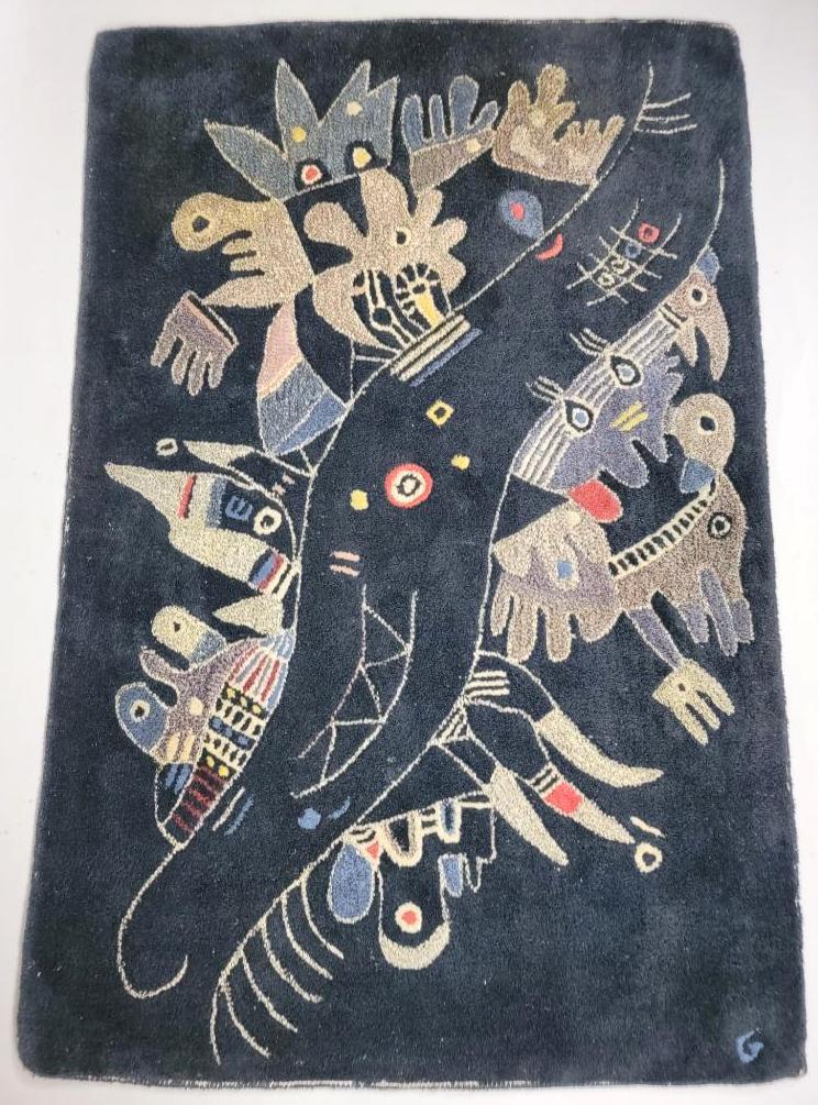 MCM Surrealist Rug, Style of Miro / Kandinsky: Woven with zoomorphic figures on a blue ground, in the style of Joan Miro or Wassily Kandinsky, signed "G" lower right corner, circa mid 20th century. Condition : has moderate age wear, fading and ver
