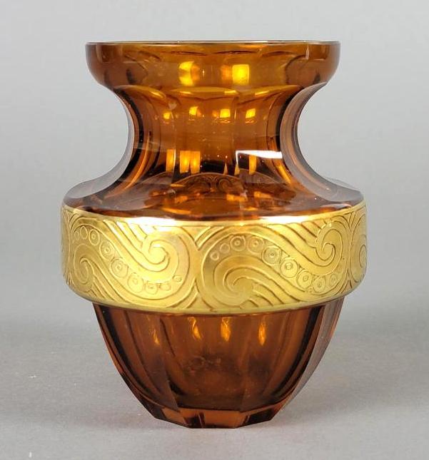 Antique VTG Bohemian Czech MOSER Art Deco Amber Glass Vase: The tapered vase form with faceted panels in a rich amber hue, features a gilded acid etched 'oroplastic' frieze presenting a repeating scrolled geometric design; Ludwig Moser / Karlovy Vary G