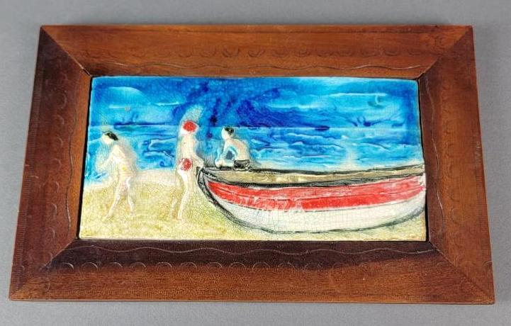 Mid Century Italian Artisan Studio Pottery Glazed Tile: The rectangular crackle glazed pottery tile, features a beachside landscape with a vacant canoe along the shoreline, the scene imposed with three semi-nude female bathers to the left, the details pick