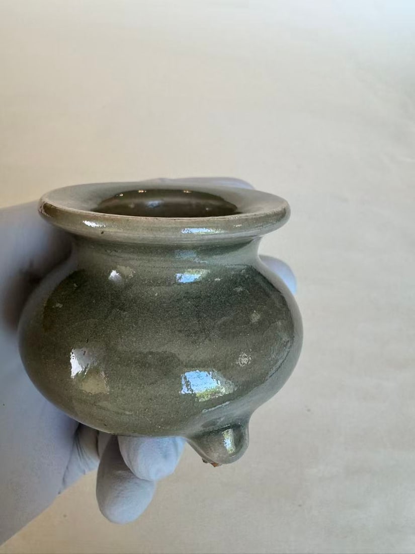 A Celadon Tripod Censer: A Celadon Tripod Censer? size D 2 1/2 in