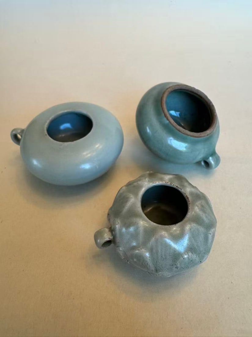 A Group of Three Longquan Celadon Bird Feeders, Possibly Yuan Dynasty (1 of 5)