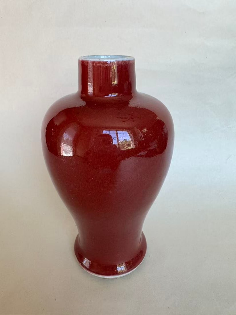 A Red-Glazed Meiping Vase: A Red-Glazed Meiping Vase? size H 7 in