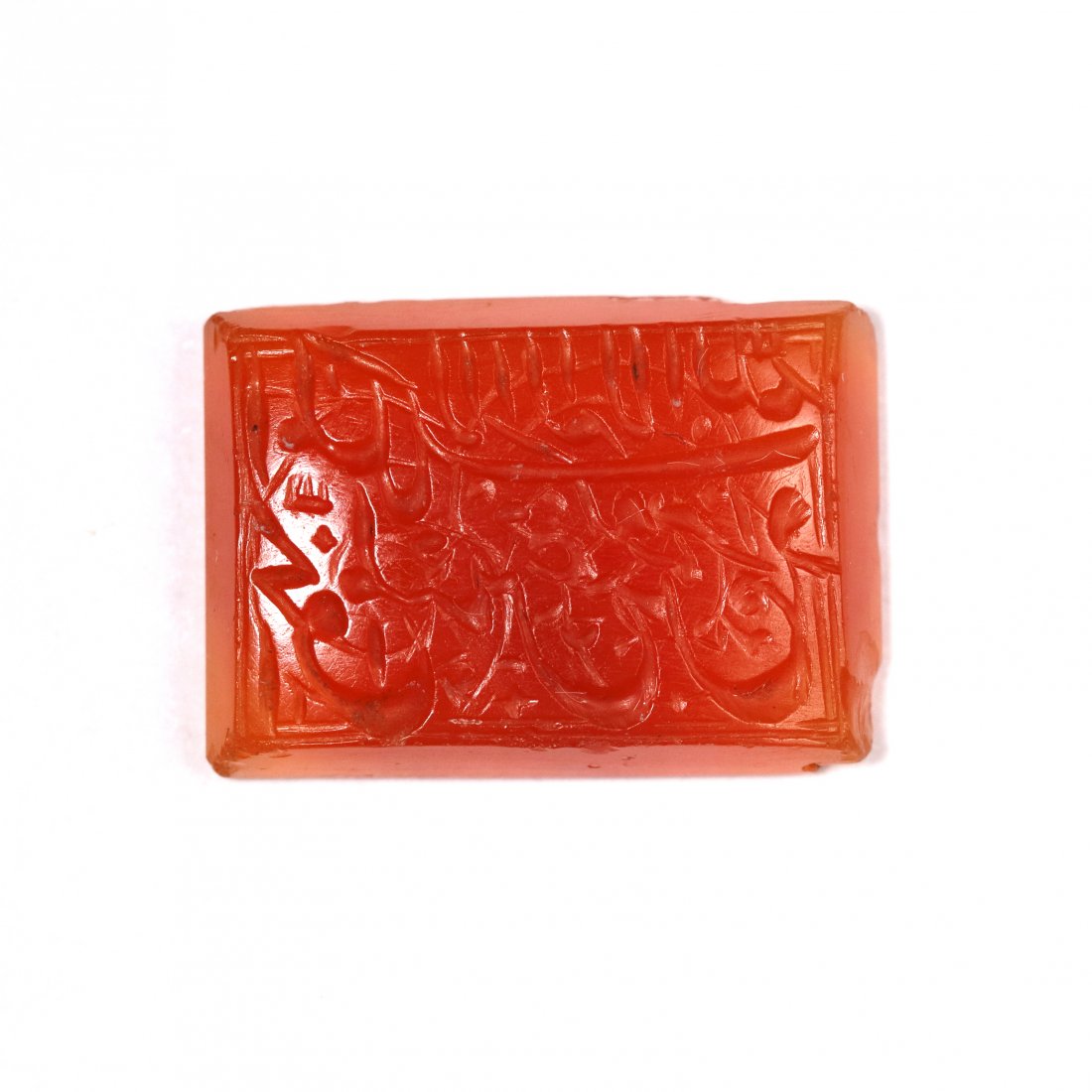 Carnelian Intaglio with Persian Inscription: An orange carnelian intaglio rectangle with Persian inscription. Early Safavid or Timurid Period, c. 1500 CE. Dimension: 1.9x1.3x0.4cm. Private Shanghai collection.