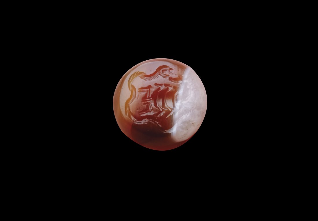 Sasanian Sardonyx Domed Magic Seal with Scorpion: A Sasanian sardonyx domed magic seal with a scorpion. Sasanian Persian, 224 - 651 CE. Dimension: 1.5x1.2cm. The seal is made of sardonyx. On its truncated surface, it is engraved in intaglio a scorpio