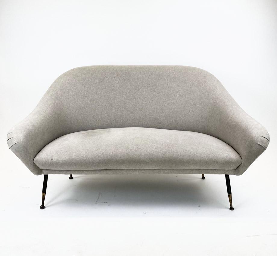 Vintage Mid Century Ico Parisi Style Loveseat: Phenomenal Loveseat has been reupholstered and missin original tags. Legs resemble a knoll production. The molded body has been covered in a taupe grey soft felted wool. Almost feels like ultra suede.