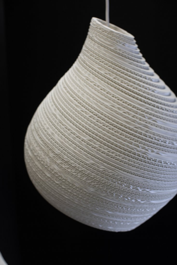 Small Hive Scraplight Pendant in White, by Greypants: The Hive Scraplight Pendant offers an organically shaped design that is handmade from re-purposed cardboard boxes and features a non-toxic fire retardant treatment. This is the smallest of the three h