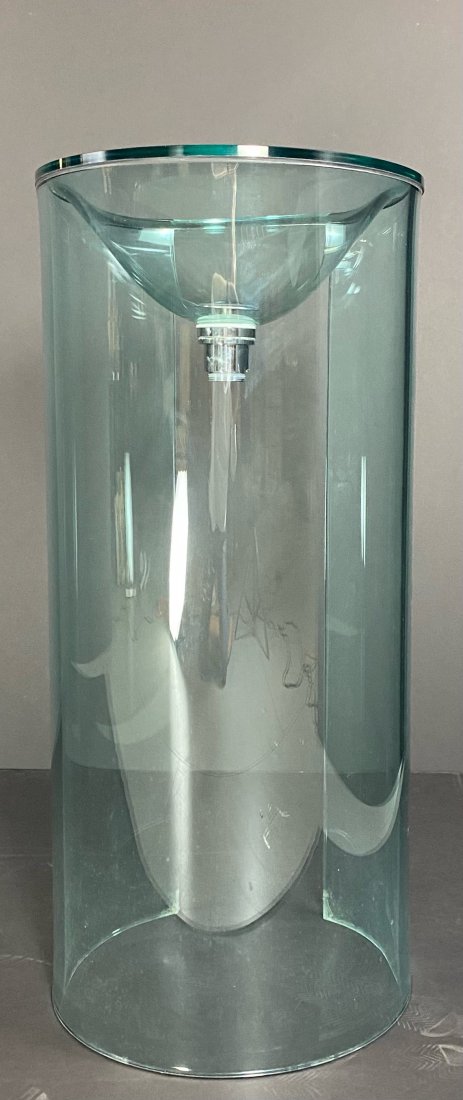 Italian Glass Pedestal Sink: Cylindrical Glass pedestal sink with open back for access to plumbing. Shipped in from Italy.35 1/4Â” H x 16 1/4Â” Width of opening is 7 1/2Â”***Pick up for this item is in Millburn, NJ 07041